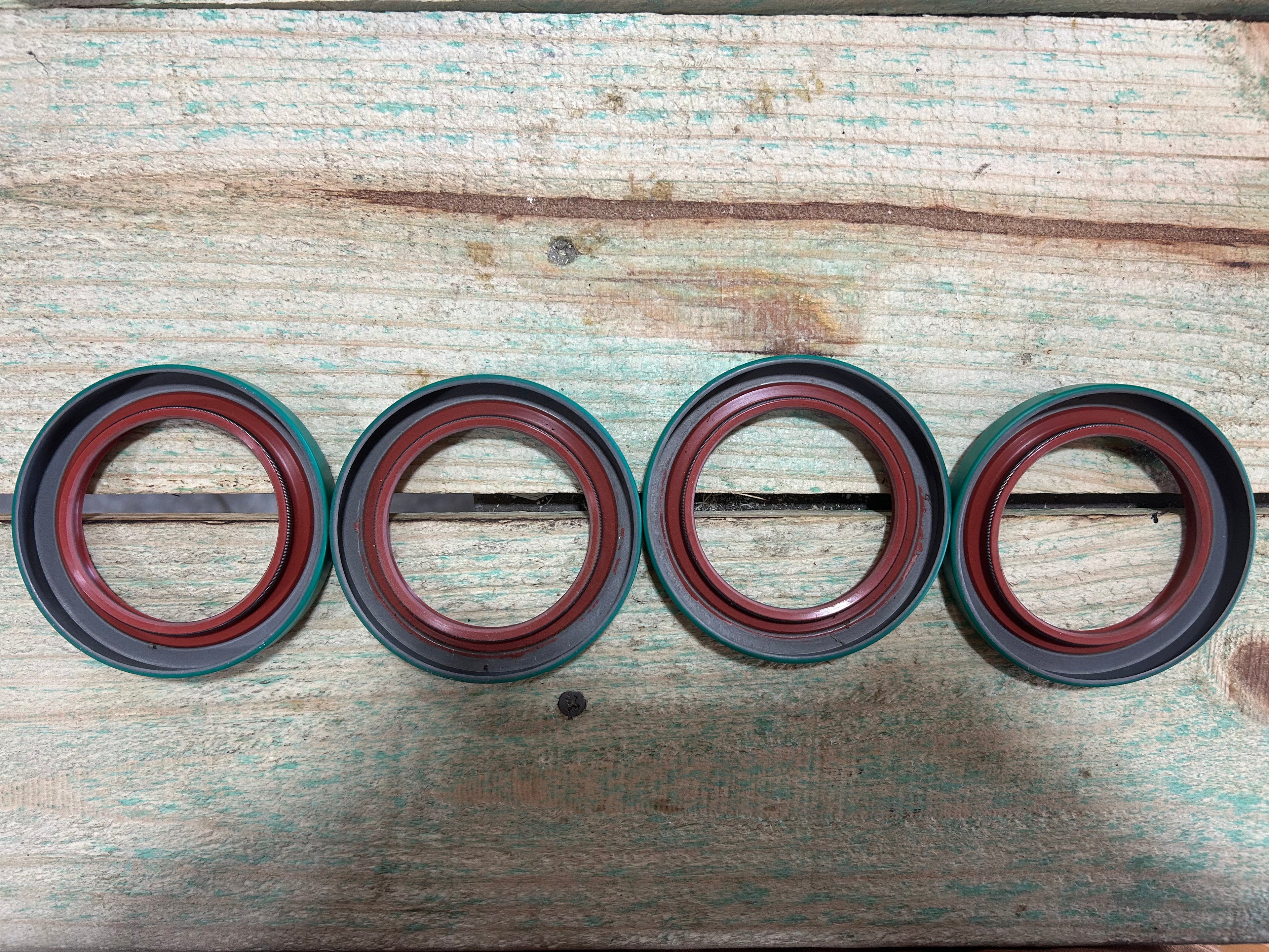 (4) Green Wide 5 Low Drag Seals (no back)