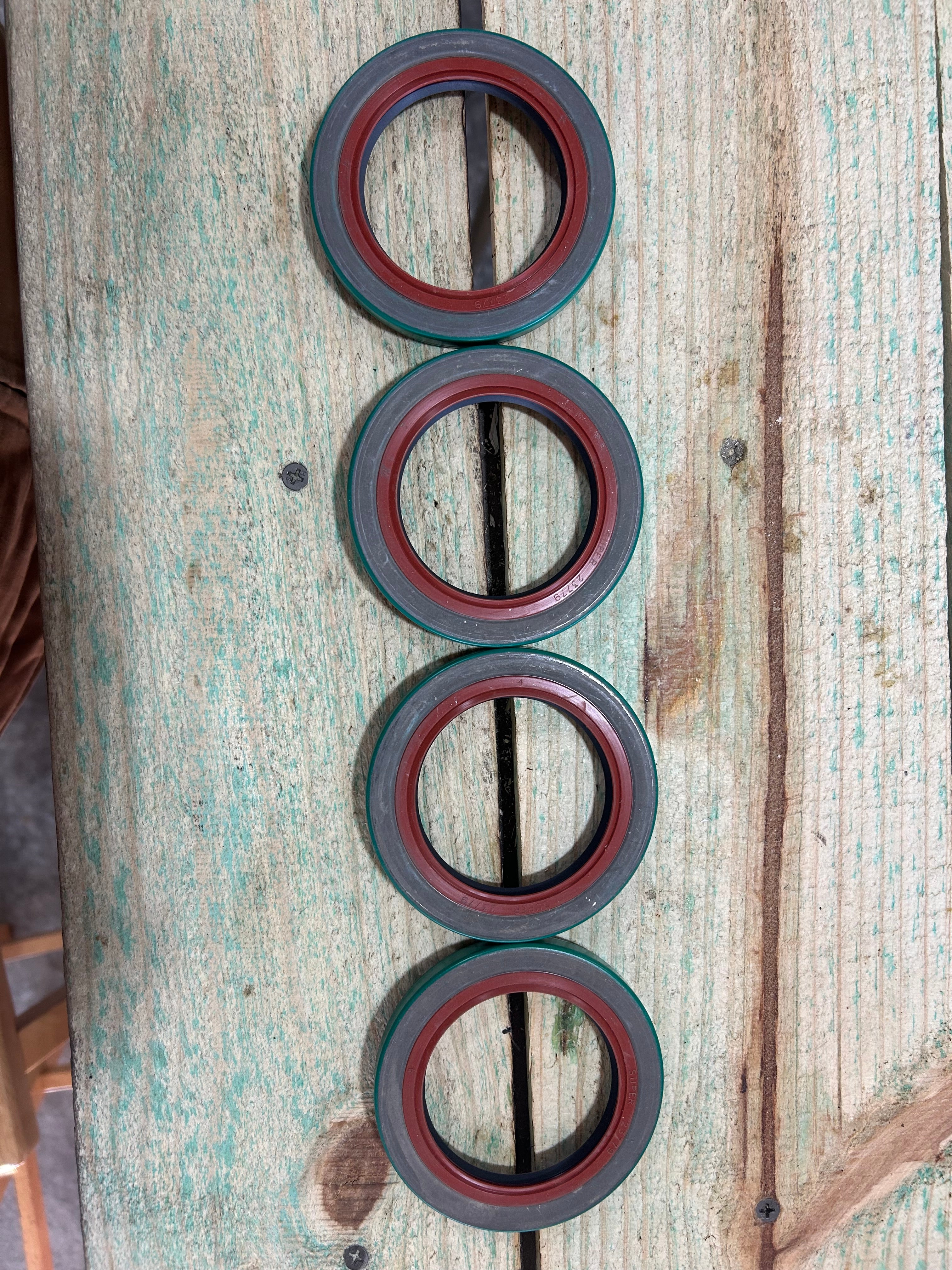 (4) Green Wide 5 Low Drag Seals (with back)